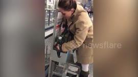 United Airlines staff in heated row with flier after telling her bag is too big - despite it fitting perfectly into rack