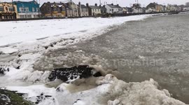 Frozen tide in north Ireland in Beast from the East Storm