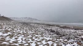 Snow on the beach at marazion