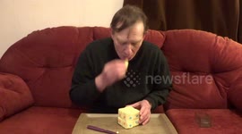 Man solves and eats functional cheese Rubik's Cube puzzle