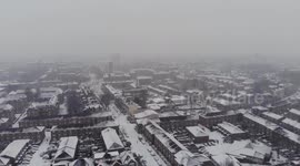 Aerial flyover in Hackney, London during the snow storm