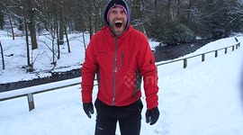 Man juggling snowballs hits camerawoman with incredibly unlucky throw
