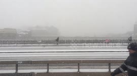 Traffic on London Bridge during snow storm