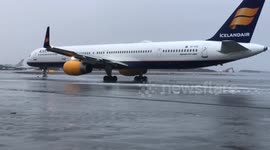 Icelandair B757 taxiing from terminal apron at Keflavik Airport