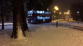 London resembles Canada in peaceful night snow storm