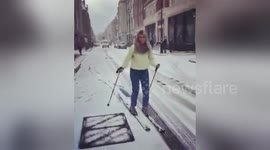 Woman skis on the streets of London instead of the slopes