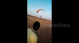 Terrifying moment tandem paragliding crashes