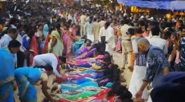 Bizaree Rituals; India man walking on the back of women while women lay down & Allow man to walk on their back. In order to get blessing from godess & Become mother.