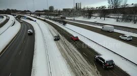 Watch car slide on road as heavy snow hits UK