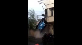 Internet cafe building collapsed caused by the foundation was eroded by rushing streams