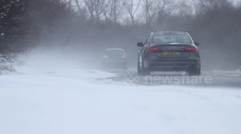 Beast from the East: Traffic drives through County Armagh blizzard