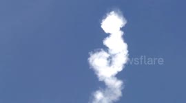 Airshow with plane and smoke