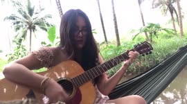 Woman's guitar fail when hammock snaps and she falls into river