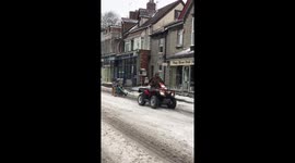 Man on DIY ski chair gets towed down Somerset high street