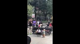 Watch this adorable toddler jam with a New Orleans brass band