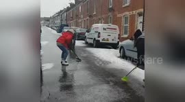 Beast from the East: Family takes part in game of street curling