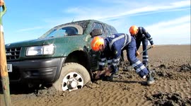 4x4 lost to incoming tide on UK beach
