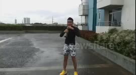 Philippines resident has fun during Typhoon Rammasun