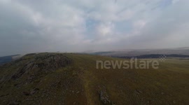 flight of a drone over Stormy clouds over sheepstor  dartmoor national park devon