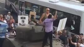 Man snaps Palestinian flag during parking protest