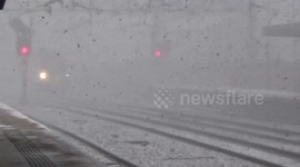 390 VT Pendolino cruises past the UFL in the pouring snow March 2018