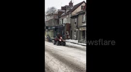Man on DIY ski chair gets towed down Somerset high street