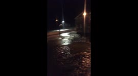 Insane tides from ocean fills up streets.
