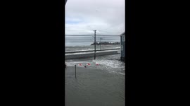 High tides from powerful nor’easter flood streets in Massachusetts