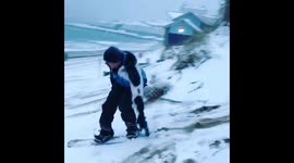 Snowboarding on Fistral beach newquay cornwall