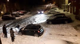 Beast from the East: Neighbours pitch in to free car from snow