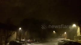 blustery snow fall at night