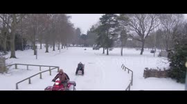 Watch man on DIY ski chair get towed by quad bike