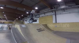 BMX rider's stunt sees him spin bike two times but he lands on his face