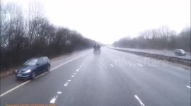 Car filmed driving wrong way down UK motorway 'at 100mph'