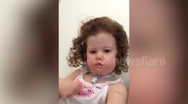 Surgery offers hope to family of little girl who has NEVER smiled because of rare syndrome