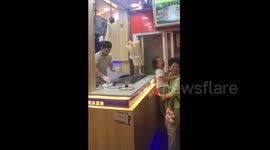 Child throws empty ice cream cone back at vendor