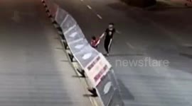 Drunk teenager pulls down huge central reservation