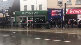 Tooting spirit in action. Commuters queue in single file to avoid flood water from burst water main https://t.co/v44OiKBVWg