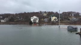 Crew attempts to unblock headwall ahead of next nor'easter in Hull, Massachusetts