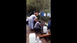 Cape Town families continue to collect water during the drought