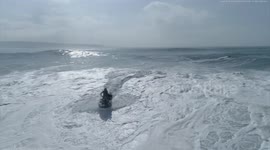 RAW: Spectacular drone footage captures surf and jetski wipeout in Portugal