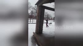 Newsflare Edit - Street fight knock out in snow