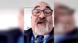 Video of a bus driver serenading passengers with a rendition of 'Let it Snow' has gone viral after they became stranded in wintry weather