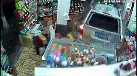 Shocking moment when a car smashes through store