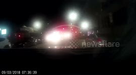 Car runs red light