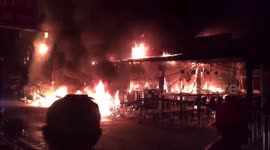 Firefighters battle flames at bars in Thai holiday resort