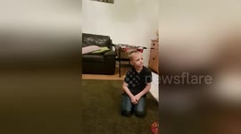 Newsflare Edit - Dad and lad - Dad scares lad watching TV - funny, prank