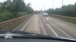 Man clings on the back of 30mph tram