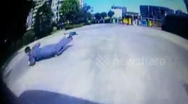 Car's near miss with skateboarder caught on dashcam