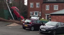 Driverless car drops 4ft and lands in neighbour's front yard